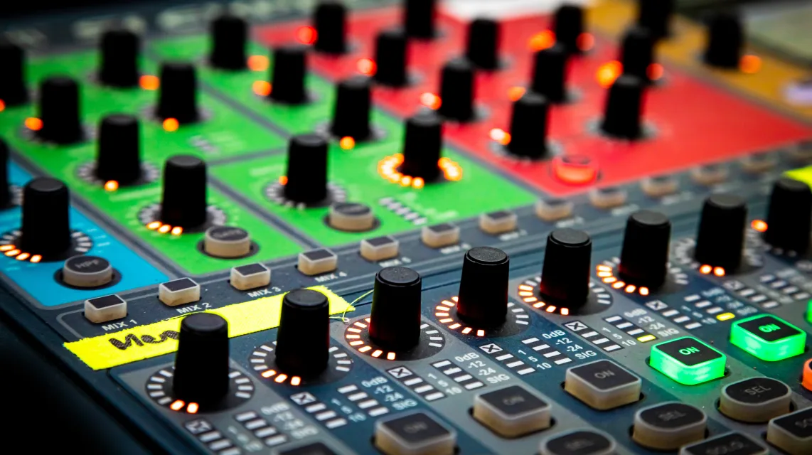 Audio mixing board and outboard equipment in a studio control room